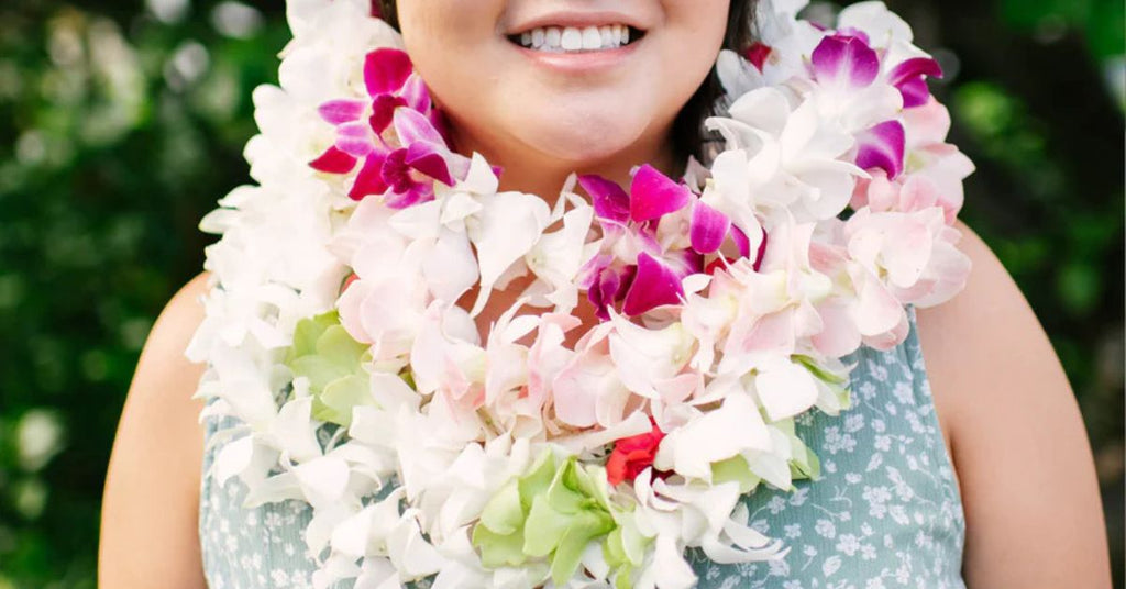 5 Style Ideas for Wearing an Orchid Wedding Lei